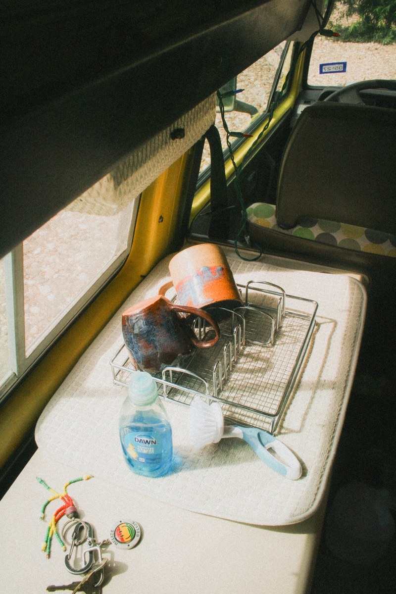 Vintage van interior with mugs and road trip details